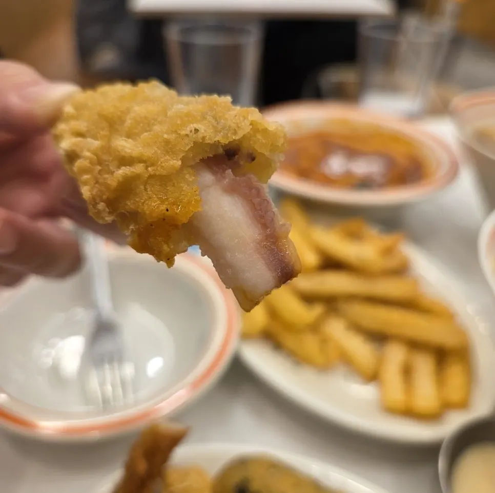 Fried squid dipped in tteokbokki sauce