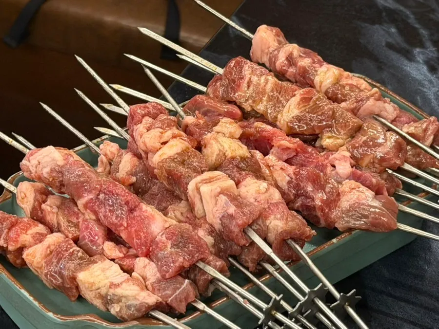 Wangkkochi on the left, lamb loin skewer on the right side by side