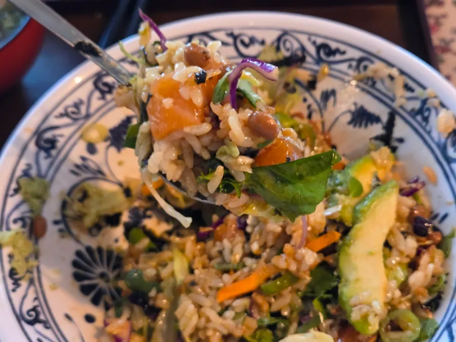 Mixing the wellbeing rice bowl before eating