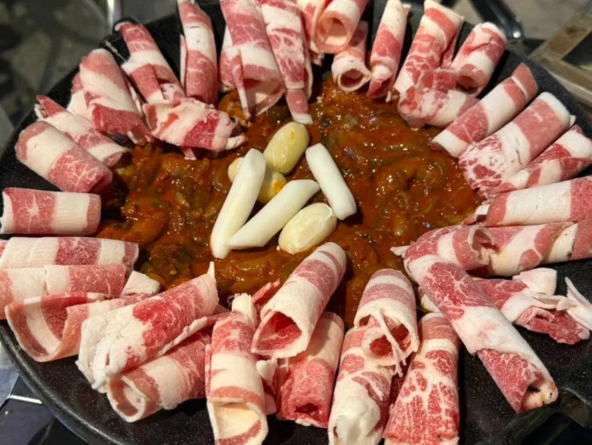 Perilla leaves and pickled radish wraps on the side