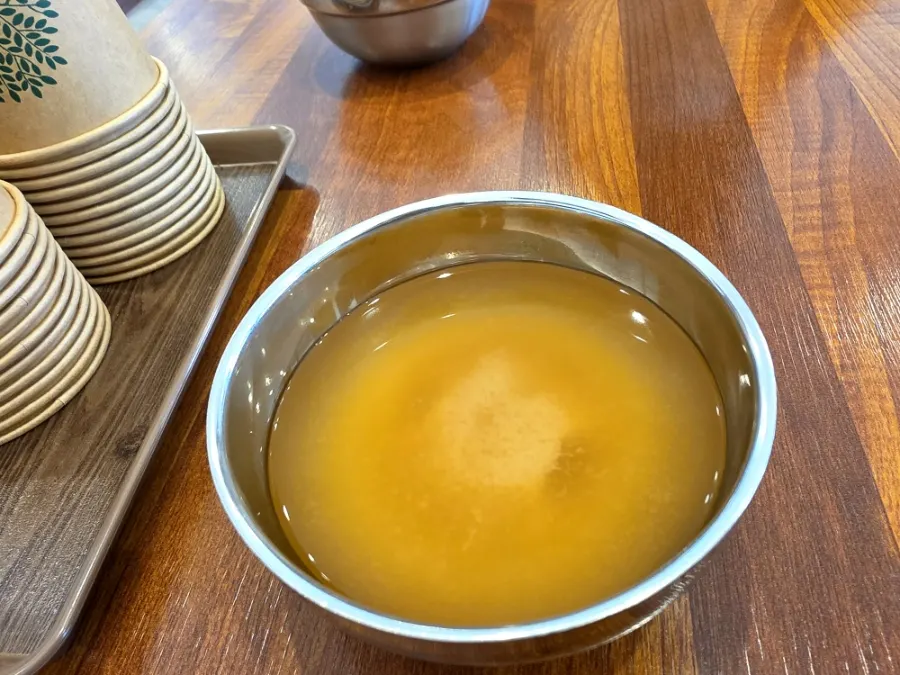 Broth soup poured into a cup