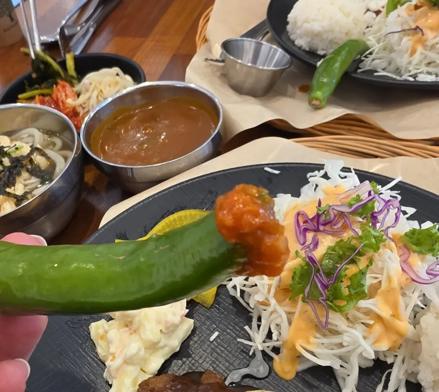 Pepper served alongside the pork cutlet