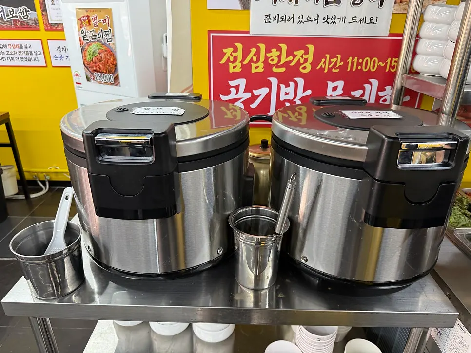 Self-bar set up in a corner of the restaurant with side dishes