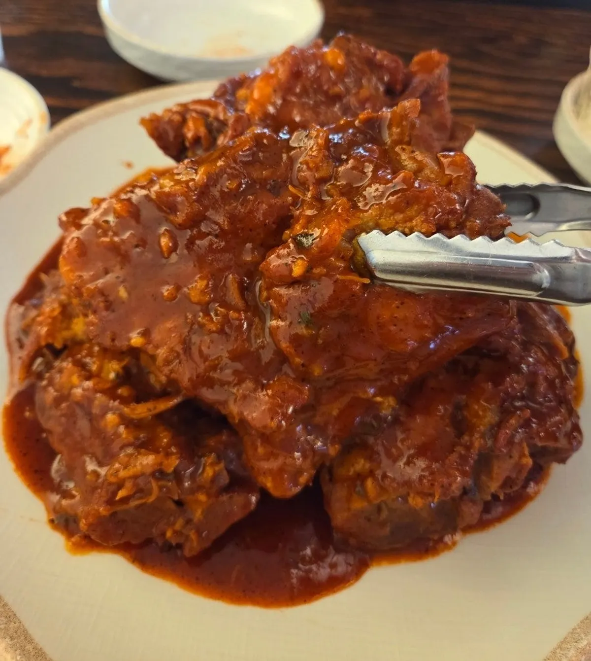 Ppyeo-jjim meat coated in spicy-sweet sauce
