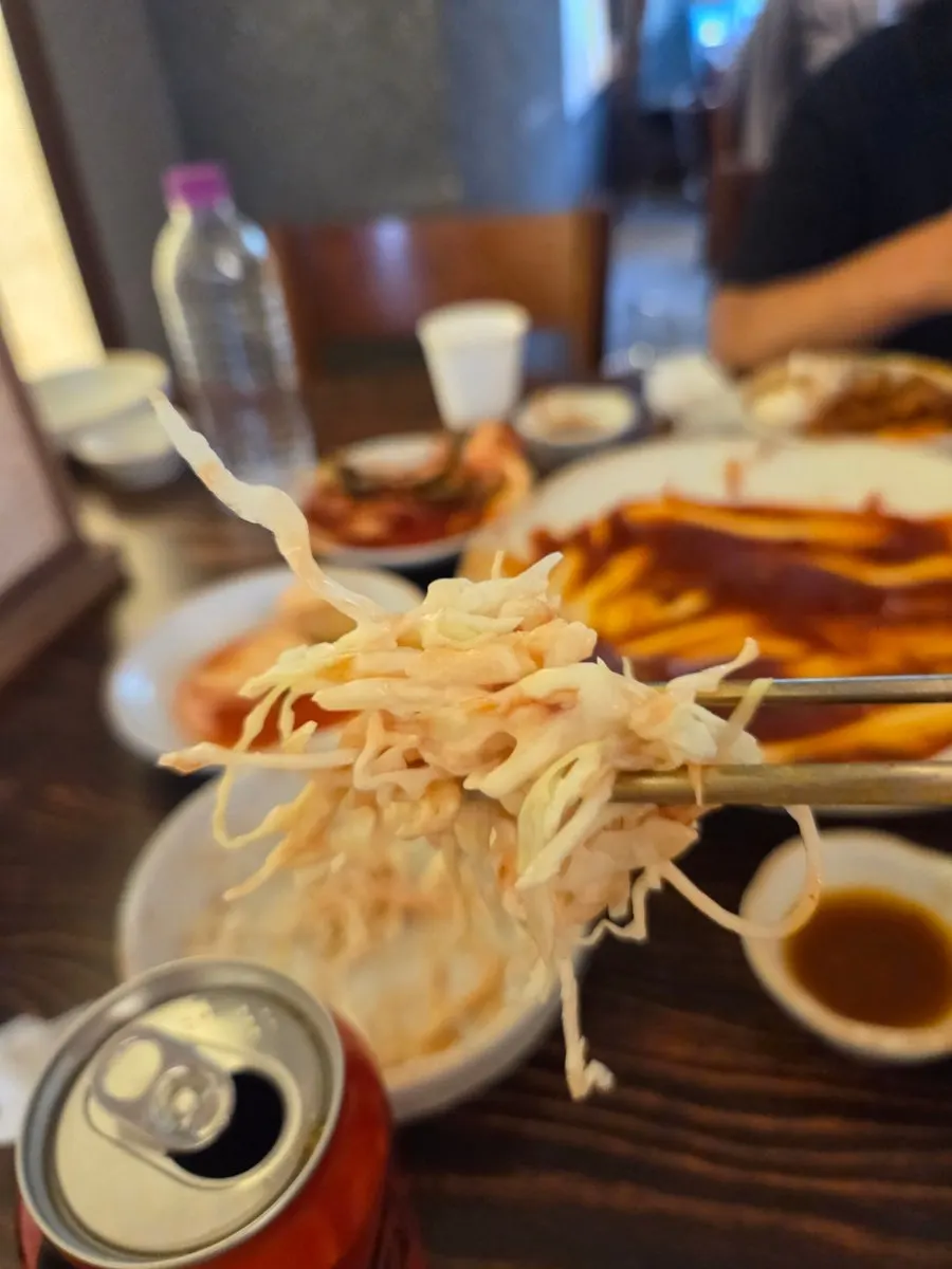 Picking up a piece of ppyeo-jjim meat