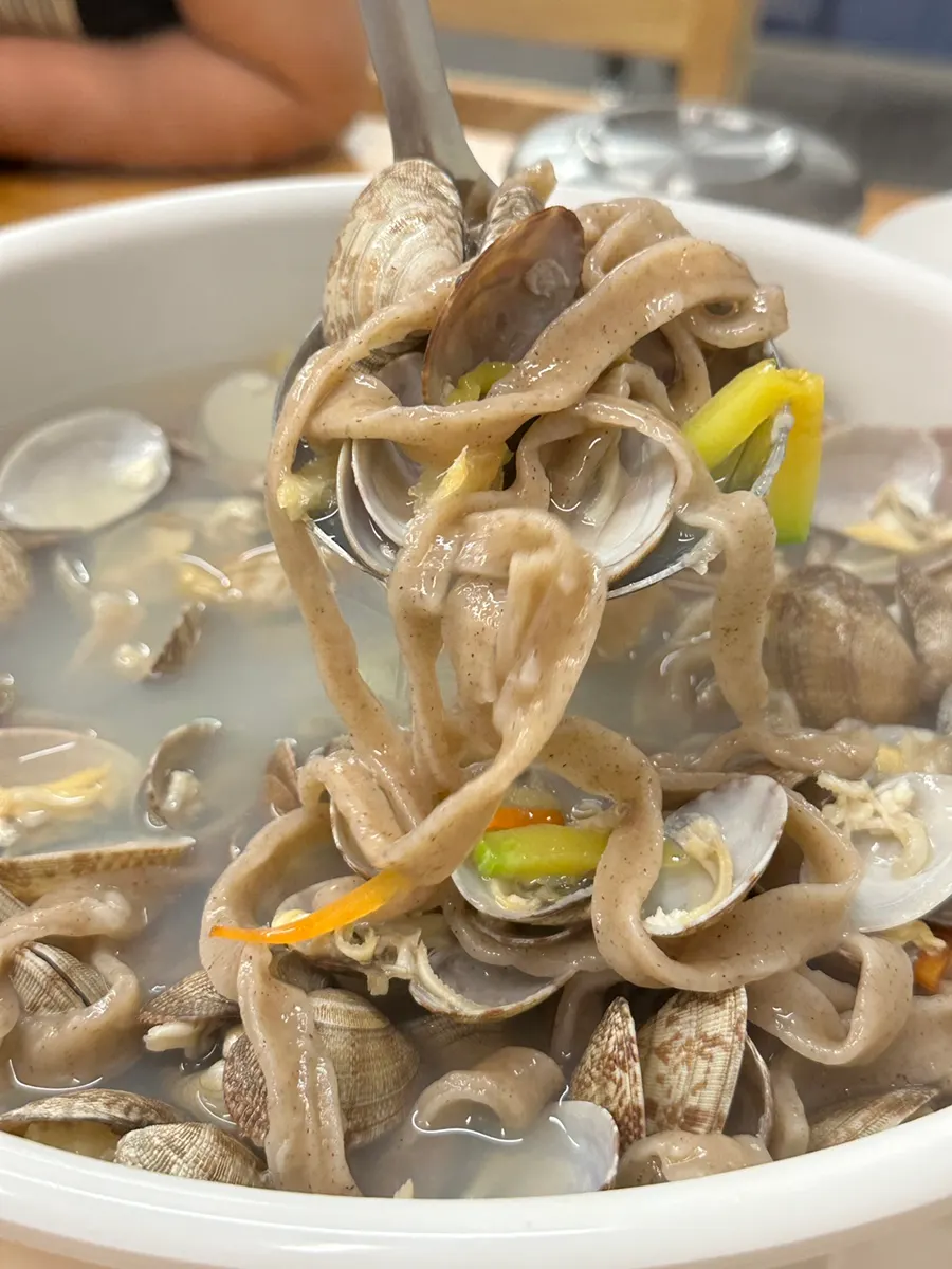 A photo of the noodle soup broth with subtle umami