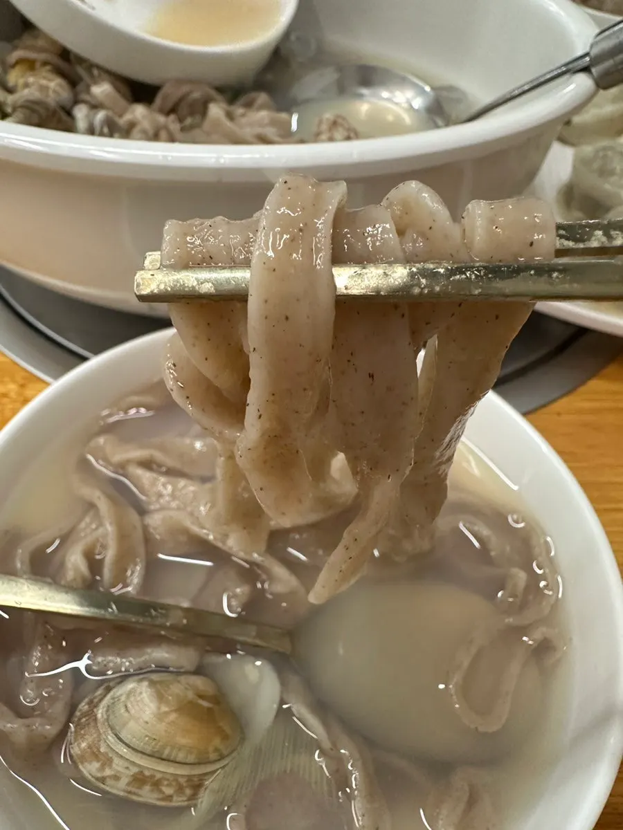A photo of Seonbawi Memil Jangteo mentioned as a group dinner spot