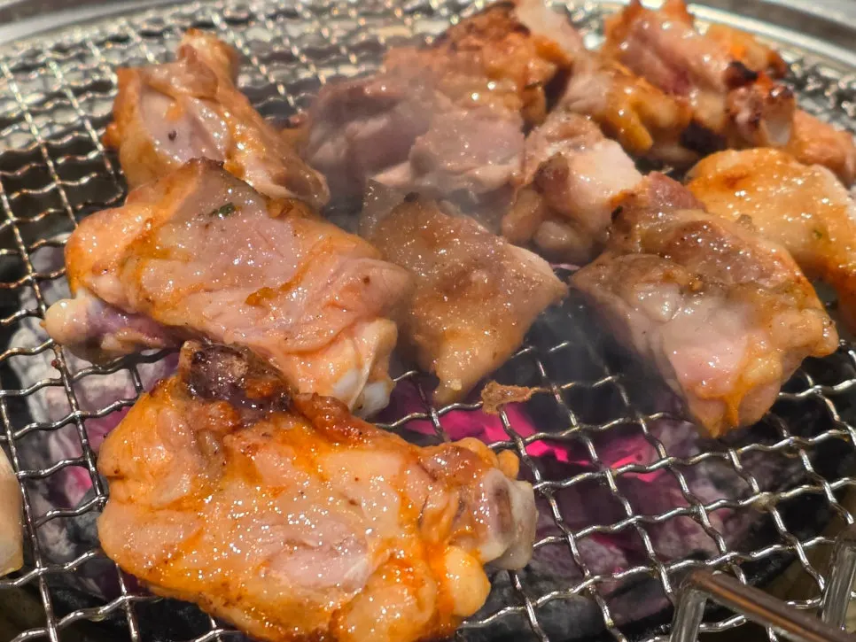Dakgalbi cooking over charcoal