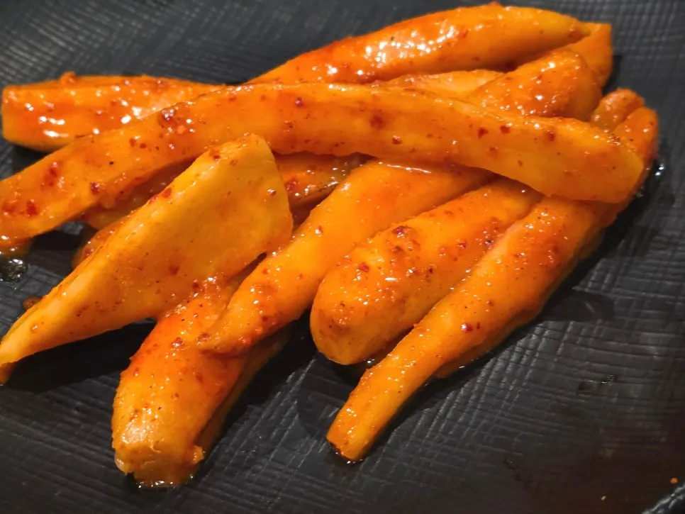 Deodeok grilled over charcoal
