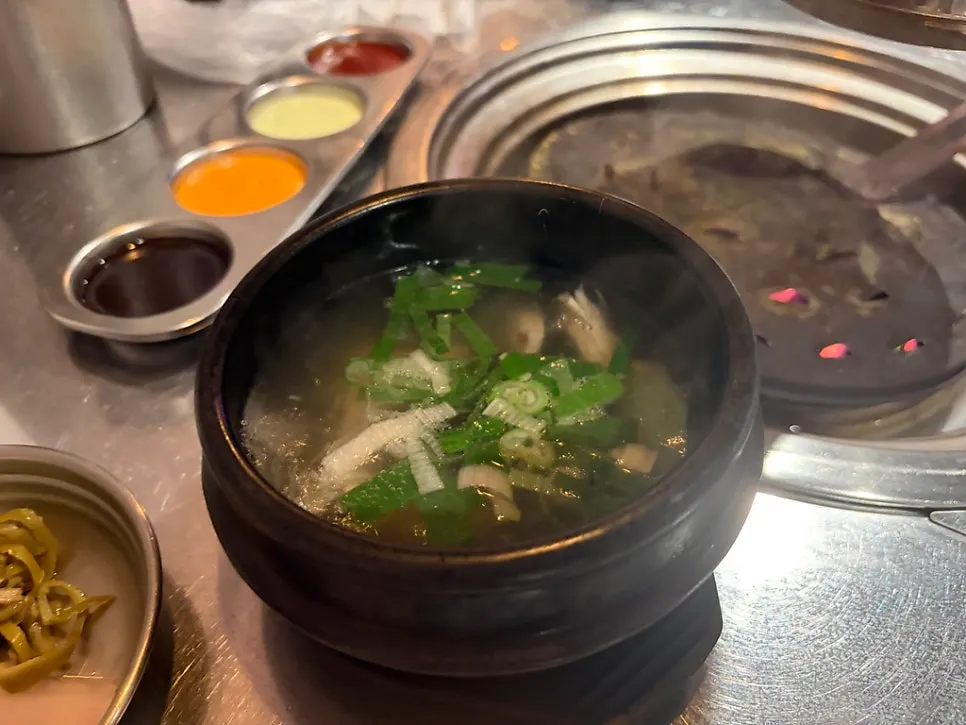 Complimentary flying fish roe and chicken soup