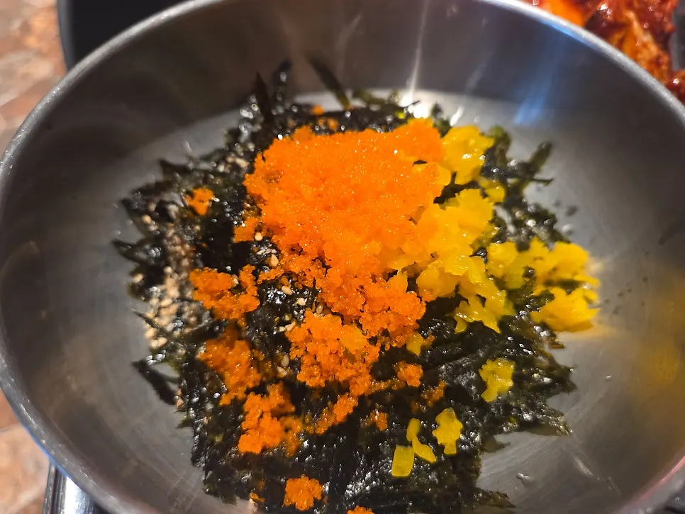 Flying fish roe rice balls served with dakgalbi
