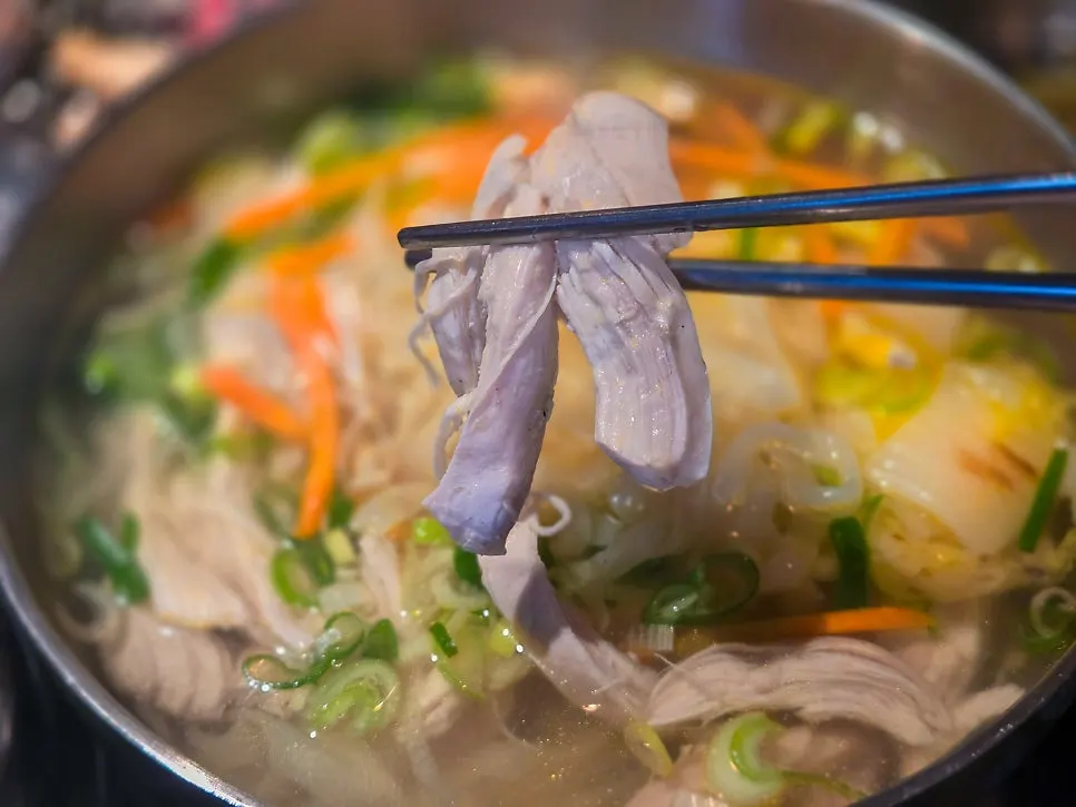 Chicken kalguksu with warm chicken broth