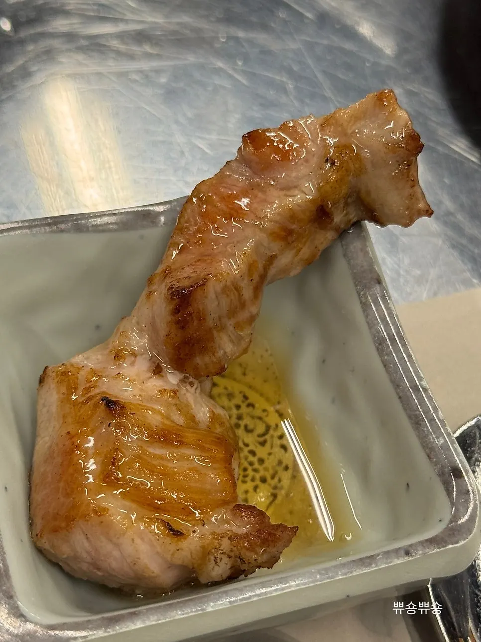 Premium pork neck dipped in sesame-oil sauce