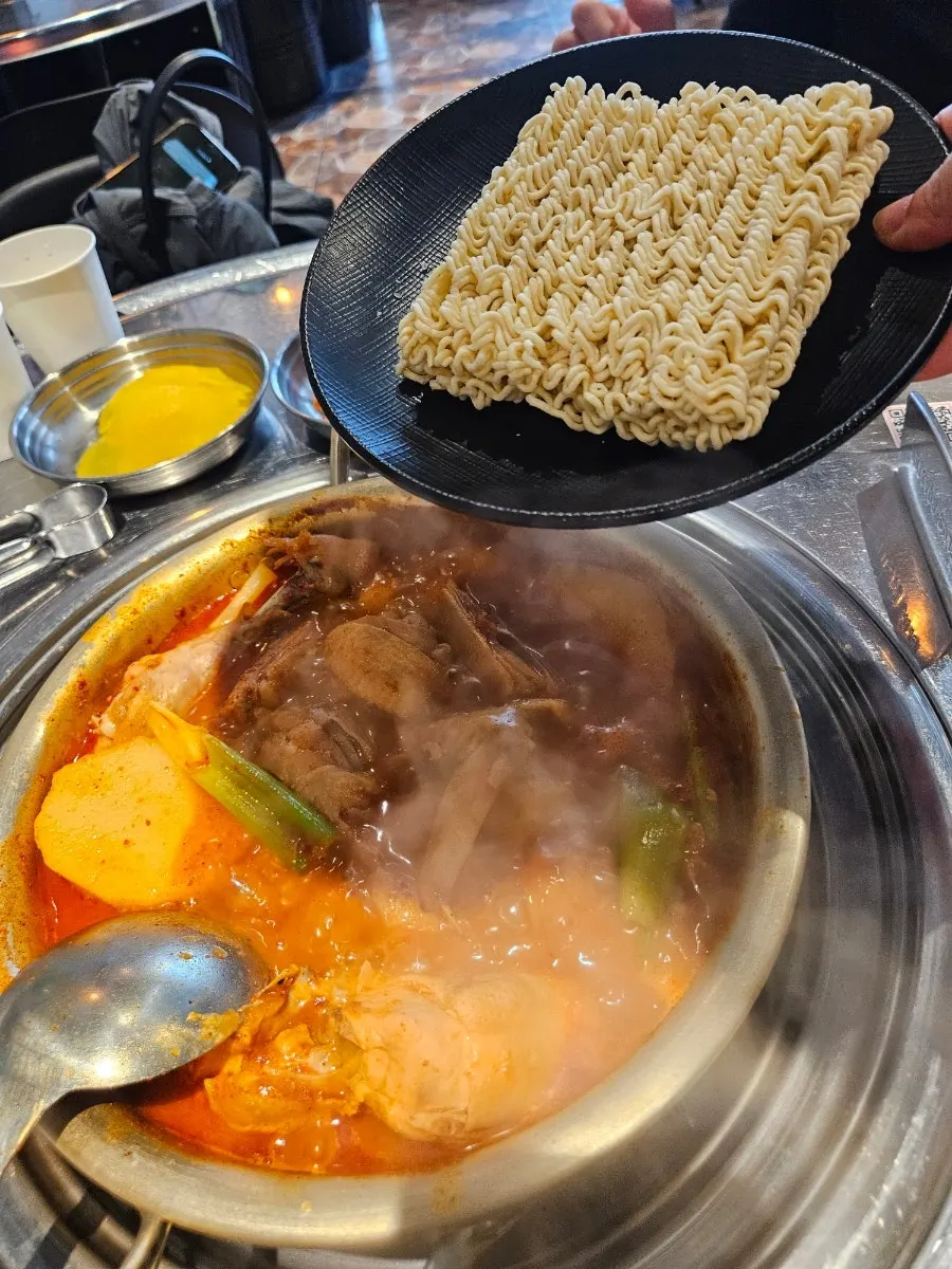 Ramen noodles added into the dakdoritang