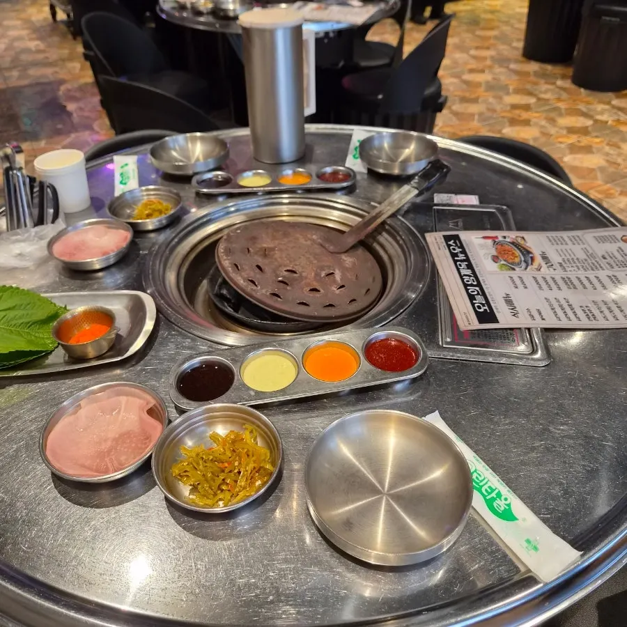 Basic side dishes already set out at the reserved table