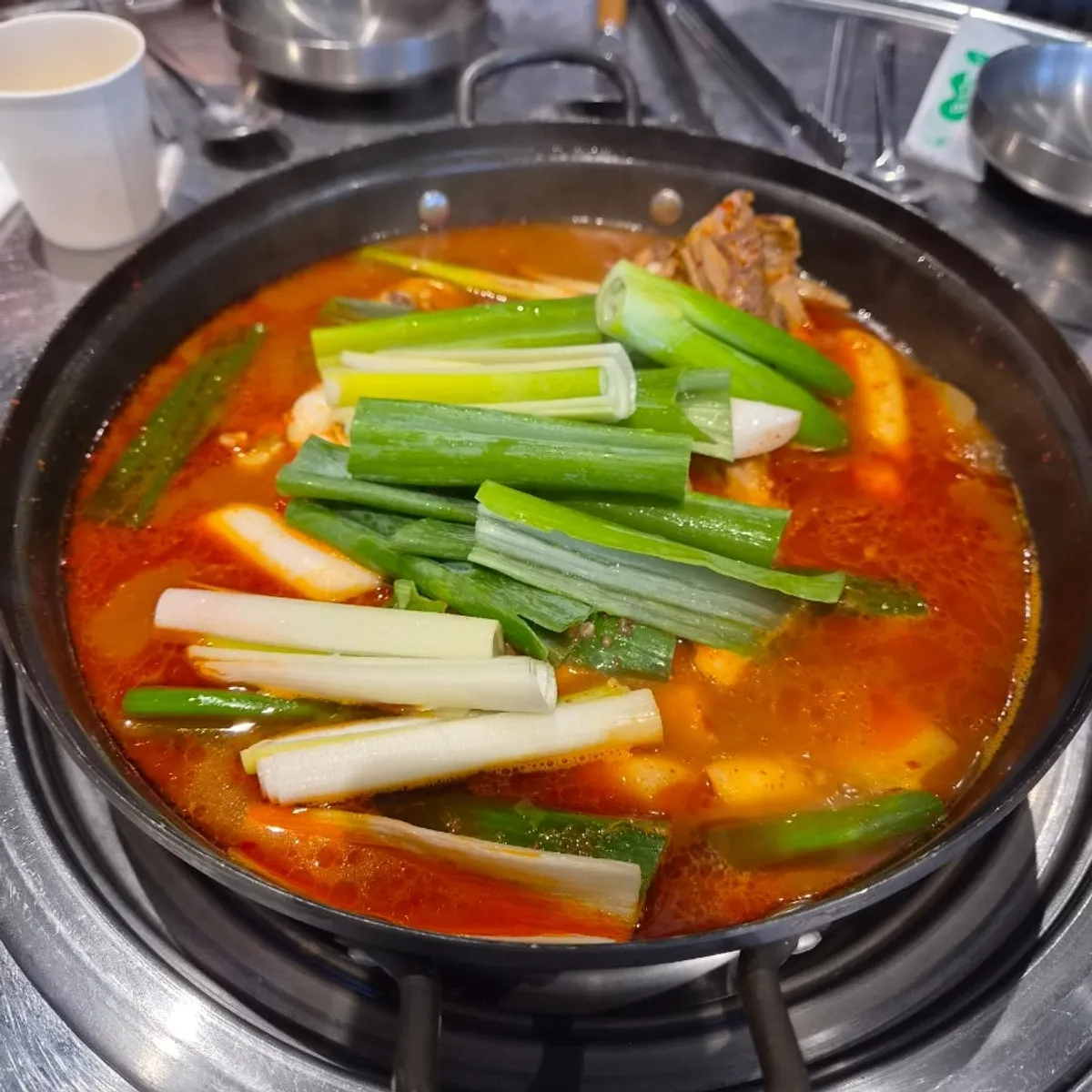 Yanggyegok's medium dakdoritang with chicken, potato, and green onion