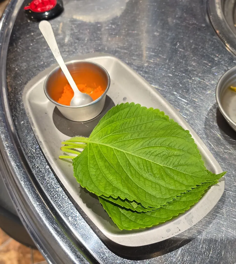 Perilla leaves and flying fish roe to accompany dakgalbi