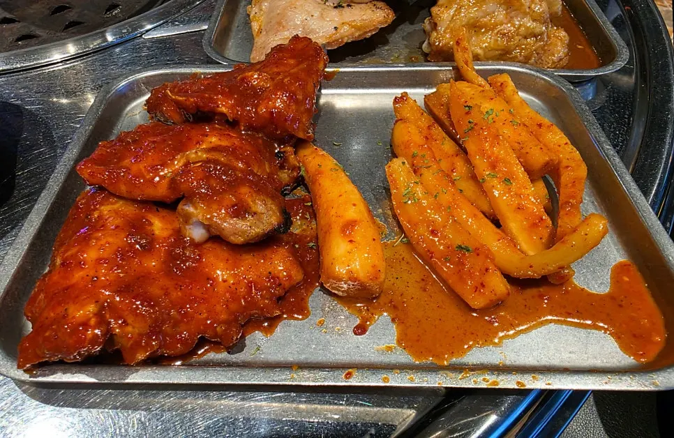 Gochujang dakgalbi and grilled seasoned deodeok