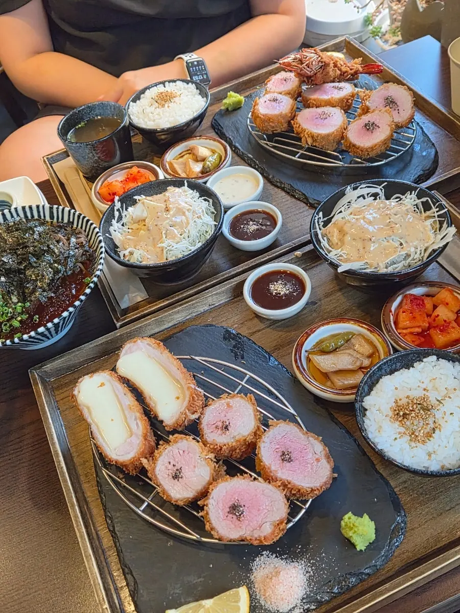 Table setting with hire katsu, cheese katsu, and buckwheat soba