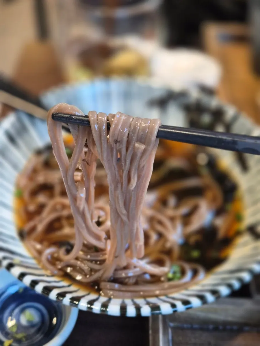 Table setting with Asahi and buckwheat soba