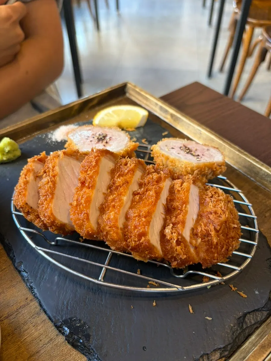 Dipping katsu into the handmade curry