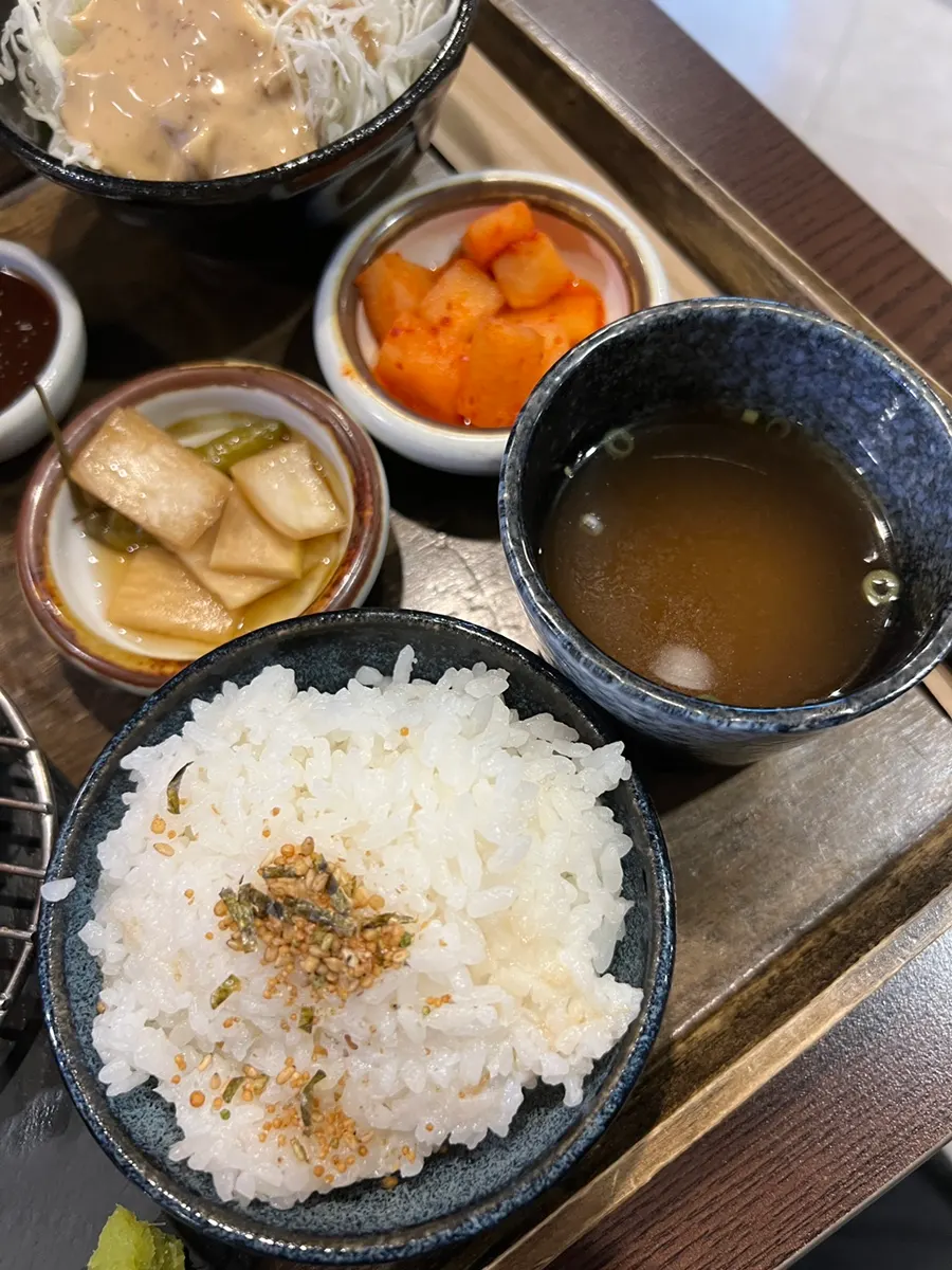 Two tonkatsu sauces with side dishes