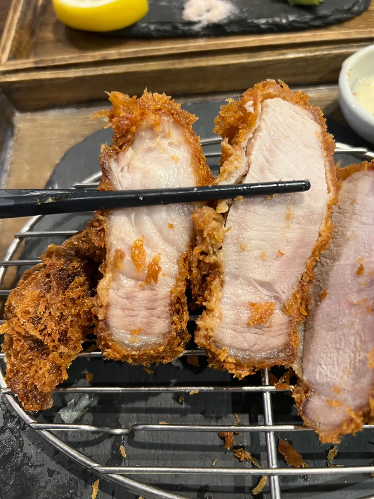 Thinly sliced cabbage salad next to the special loin katsu