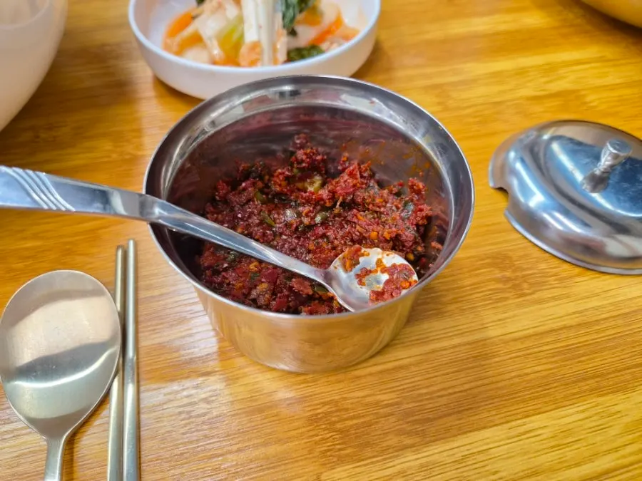 A small dish of optional dadaegi chili paste