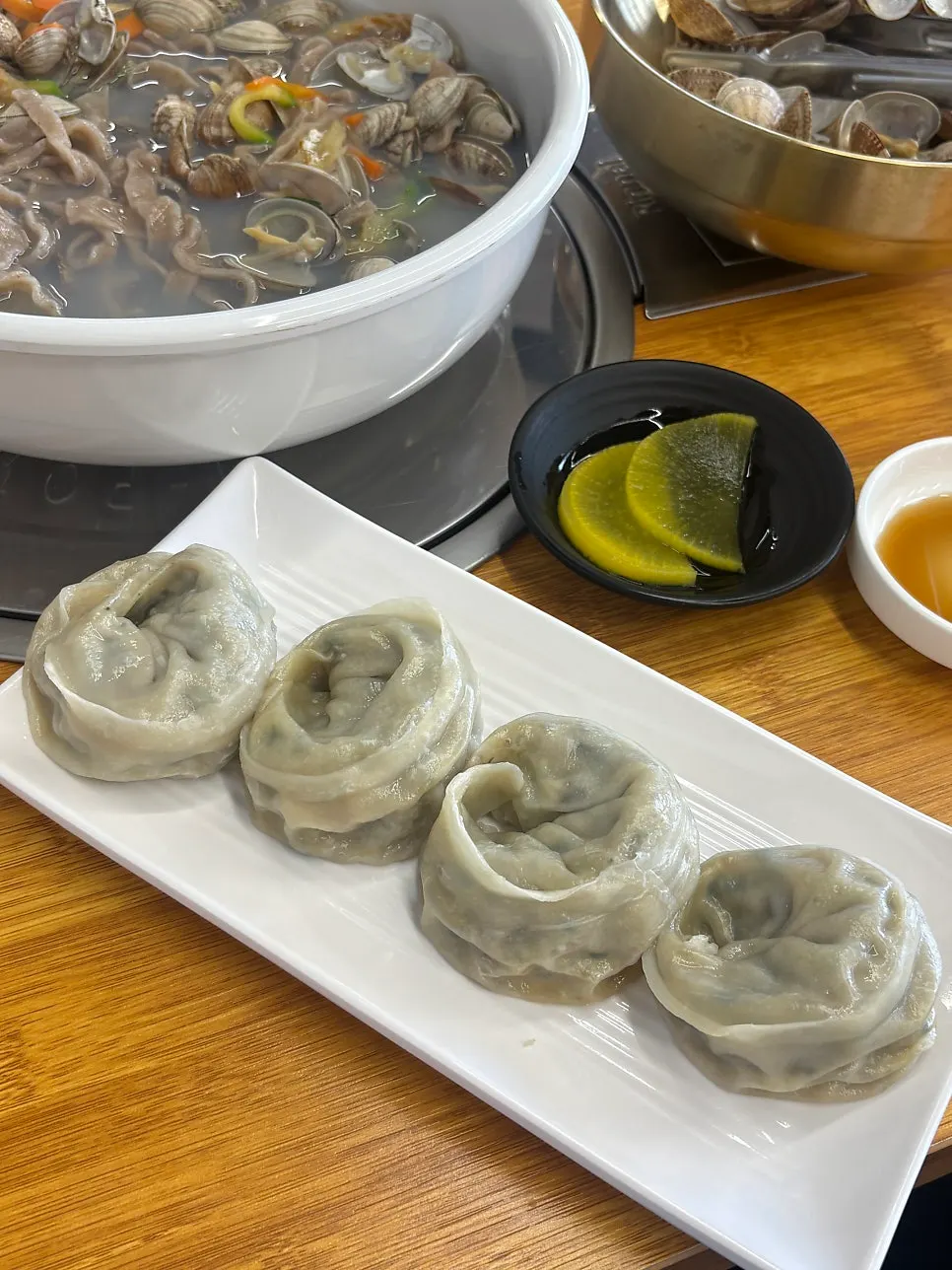 A bowl of mild buckwheat clam noodle soup