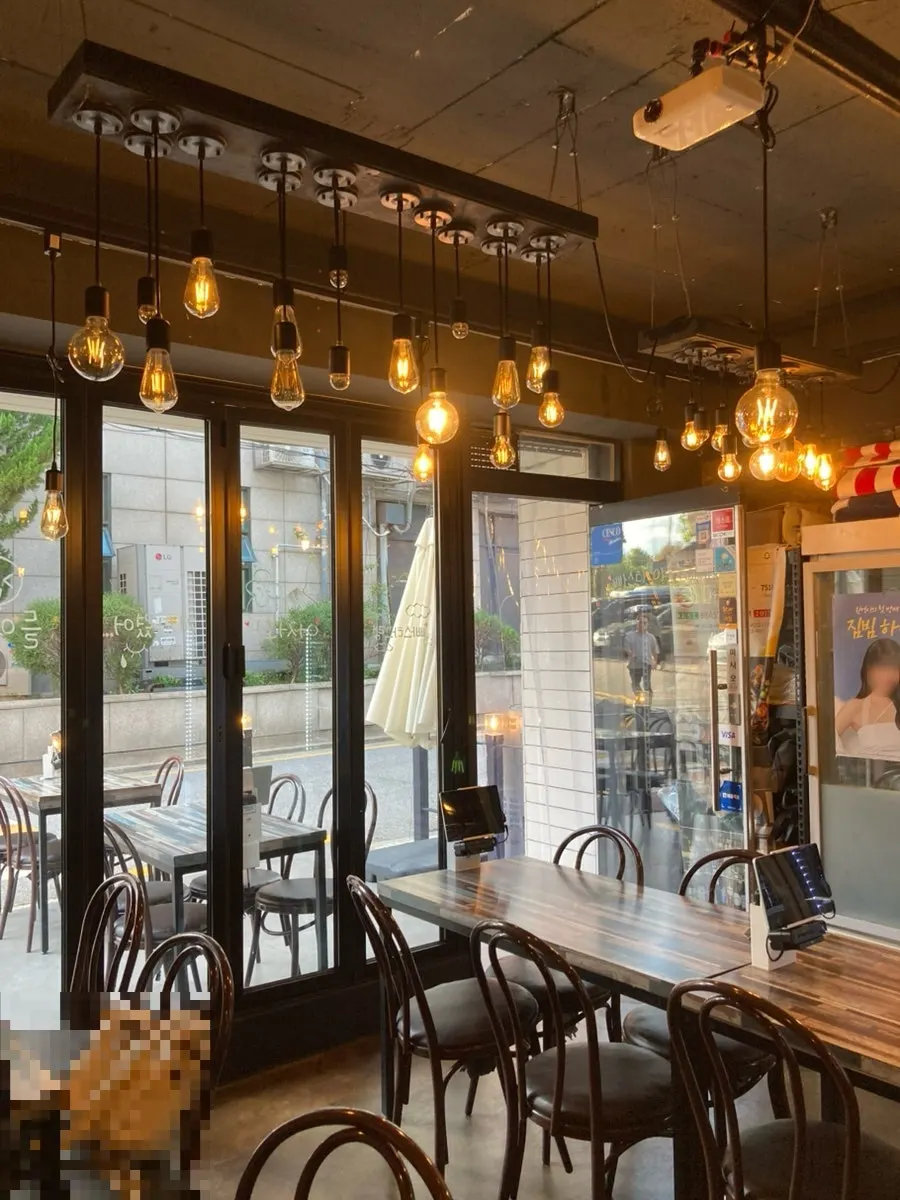 Wood-toned interior of Pasta Gram Yangjae Main Branch