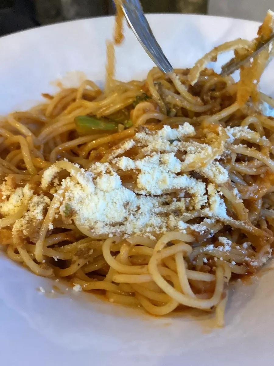 Bolognese pasta noodles mixed with ragù sauce
