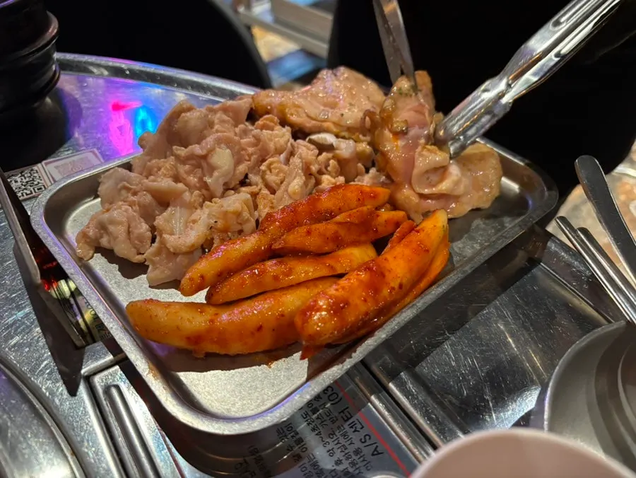 Dakgalbi combo platter on the charcoal grill