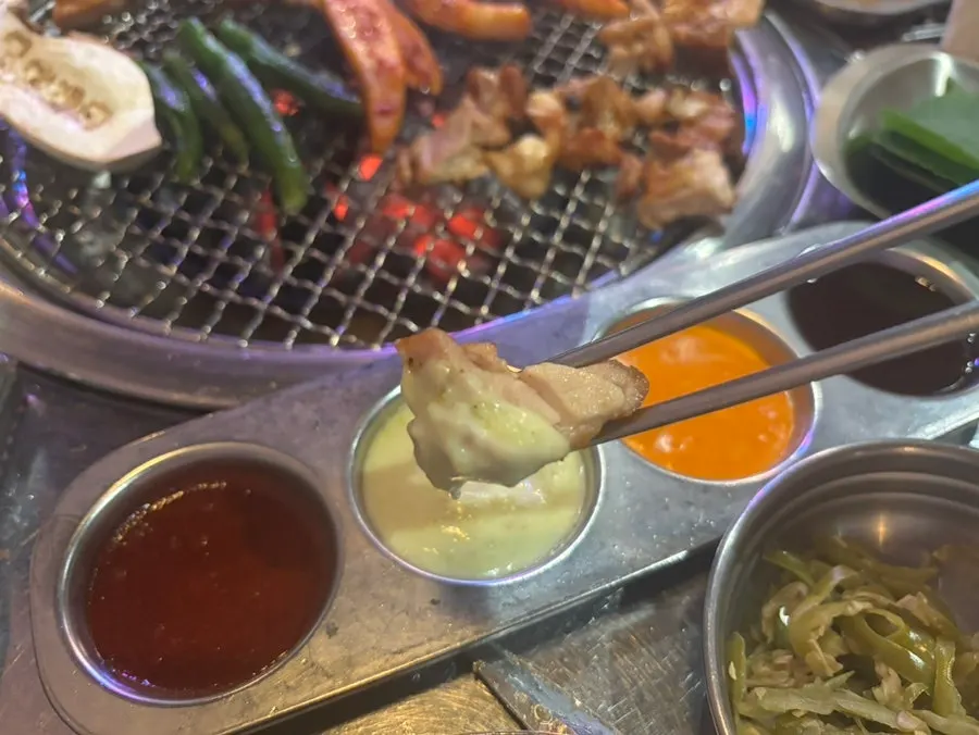 A golden-browned piece of salted dakgalbi
