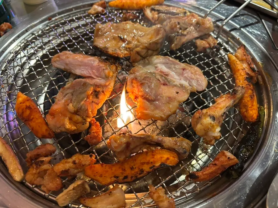 Soy sauce dakgalbi with slightly caramelized seasoning on the grill