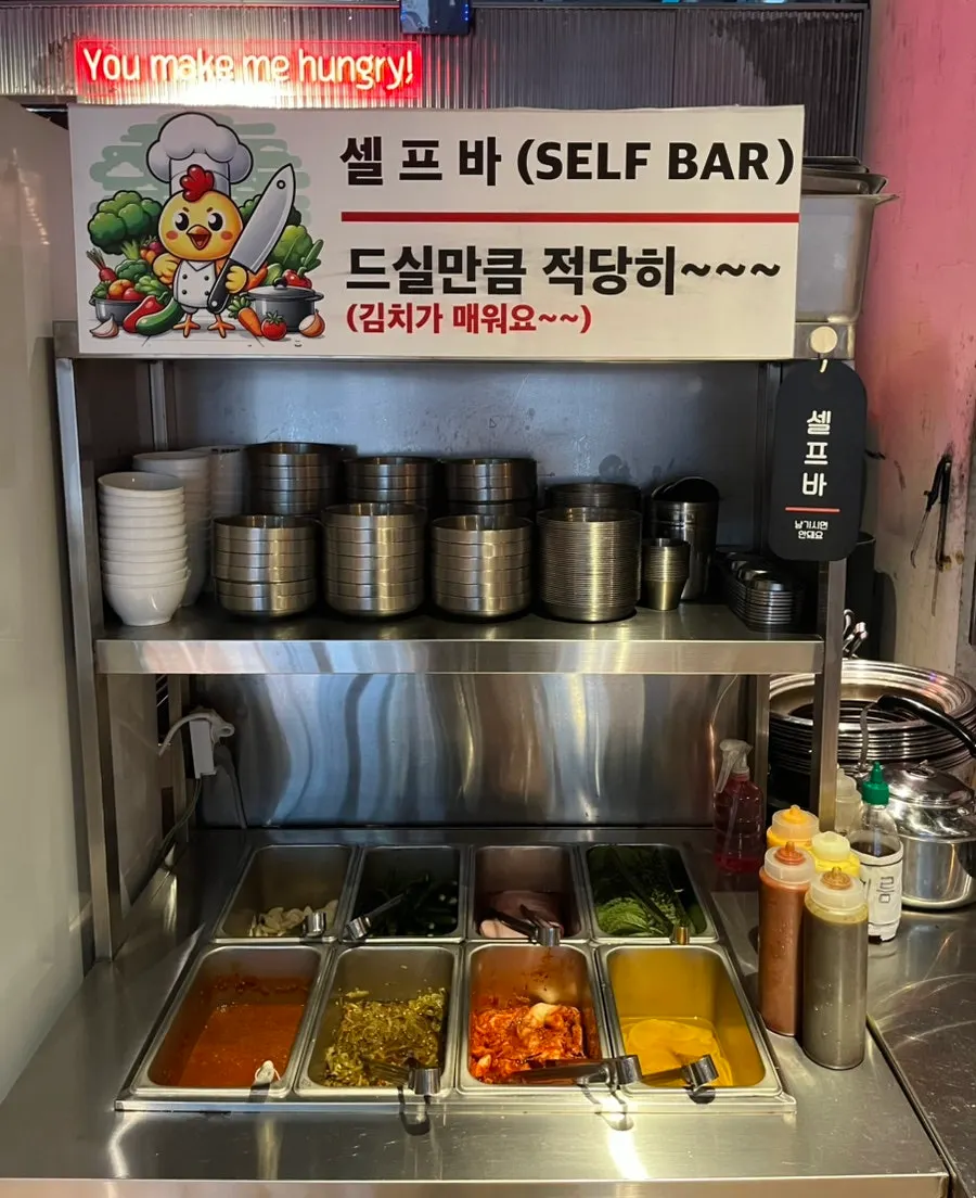 Self-serve bar with ssamjang, garlic and kimchi