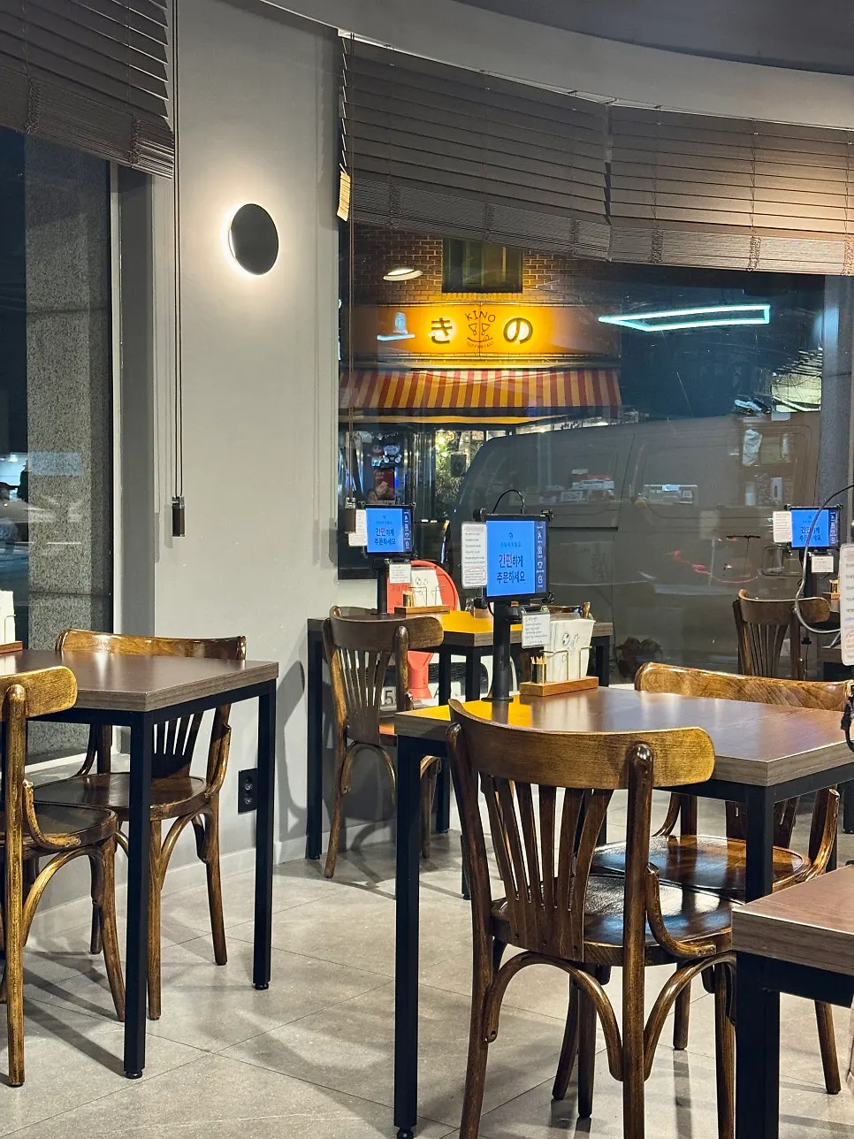 Tables filling up with customers inside Yangjae Katsu