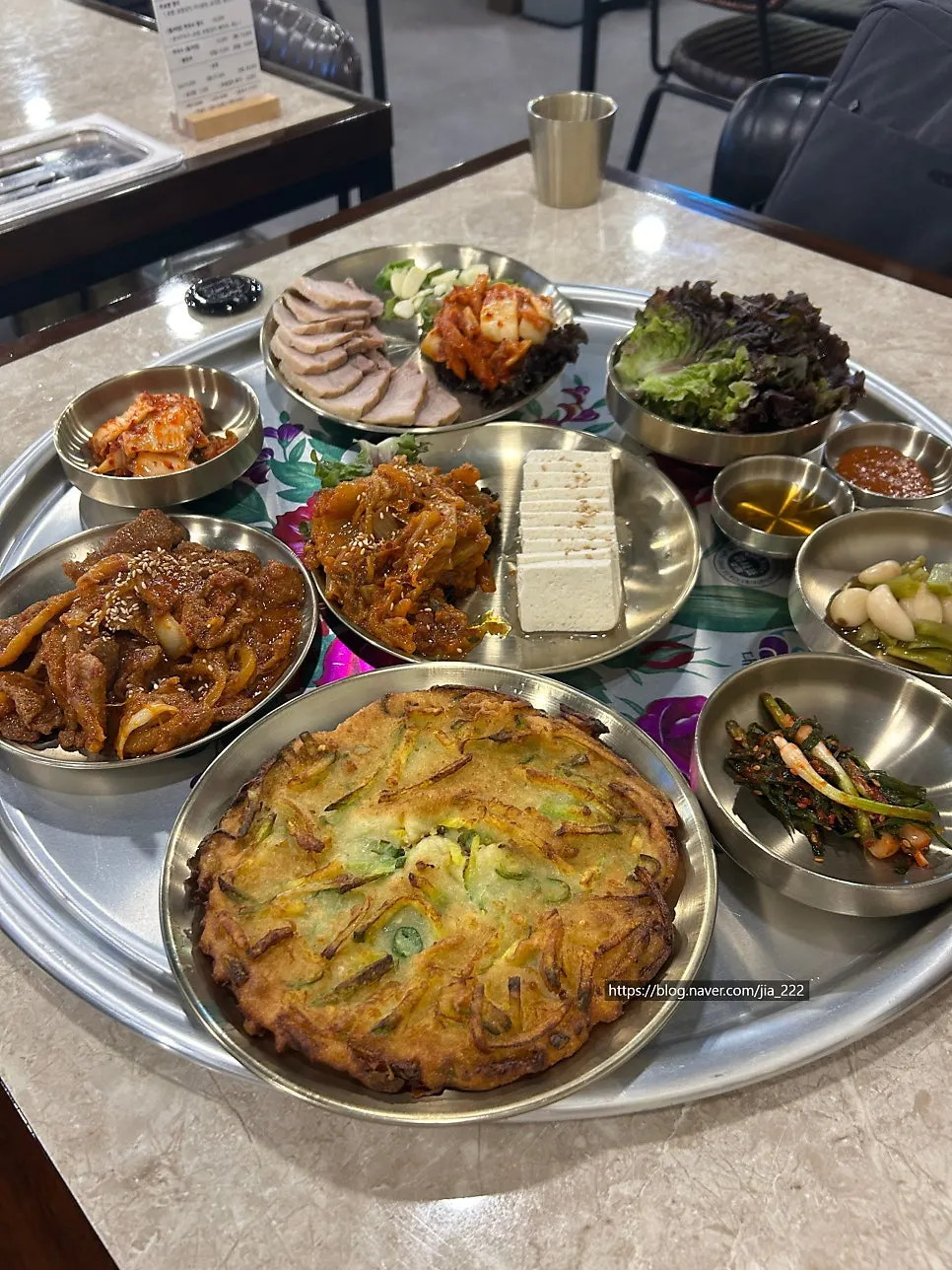 Bossam and jeyuk bokkeum arranged as part of the juanjang spread