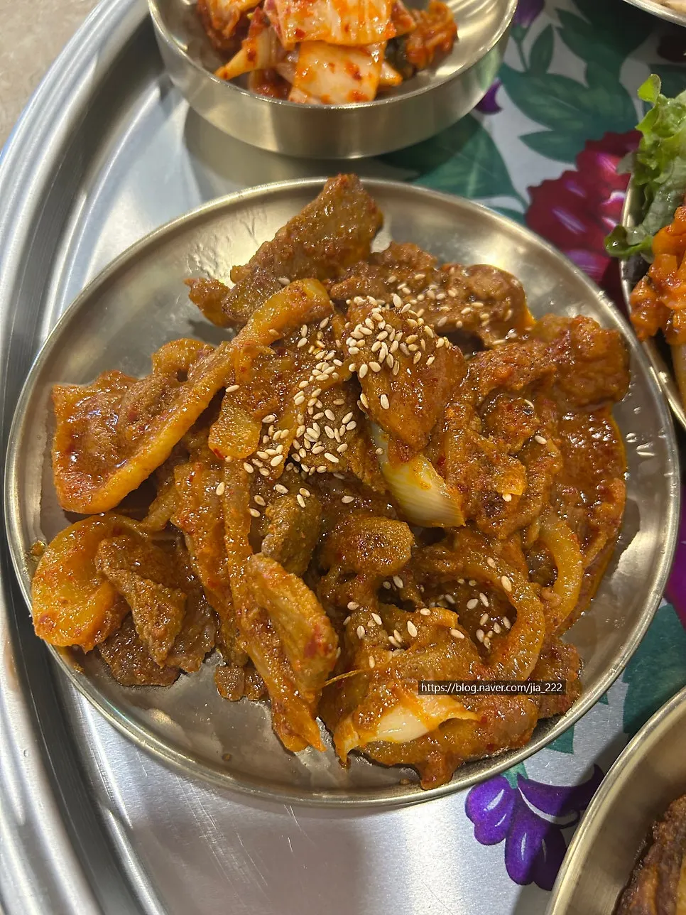 Warm tofu topped with stir-fried kimchi