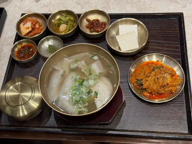 Napa cabbage kimchi, soy-seasoned radish, salted octopus, cheongyang chili pesto side dishes