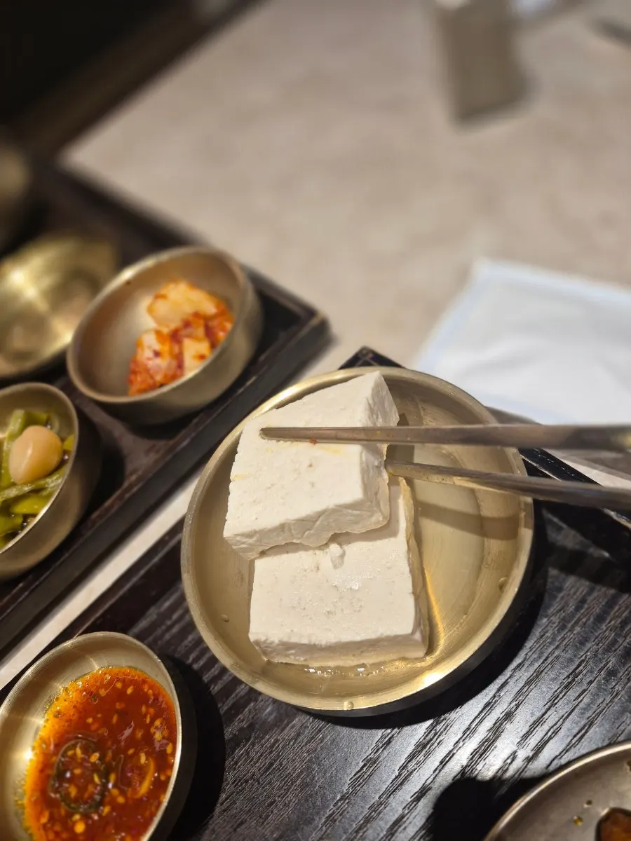 Tofu dipped in seasoned sauce