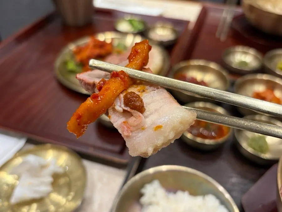Small bossam served with lettuce wraps and bossam kimchi