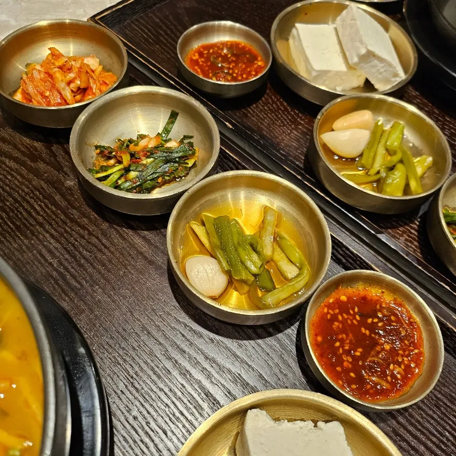 Warm tofu served with seasoned sauce