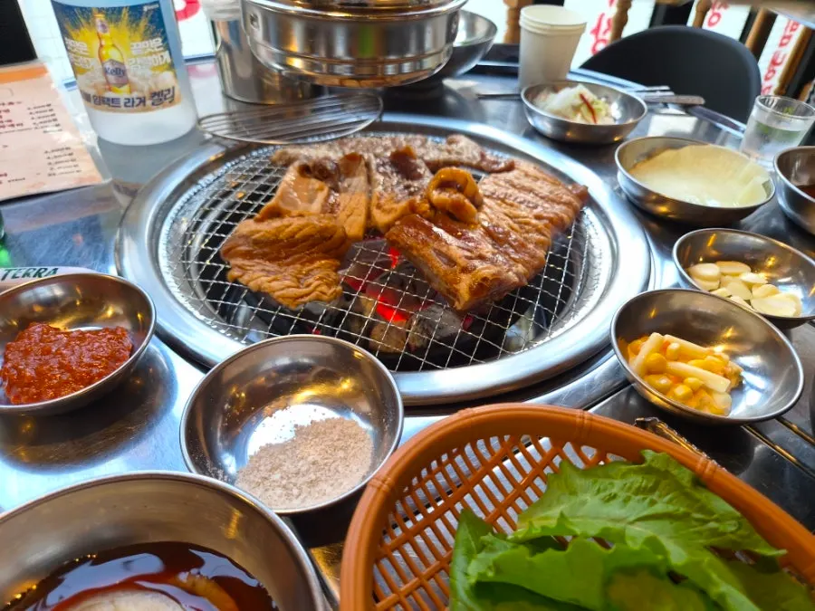 Marinated ribs sizzling on the grill