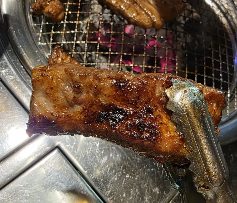 A bite of mixed donburi rice