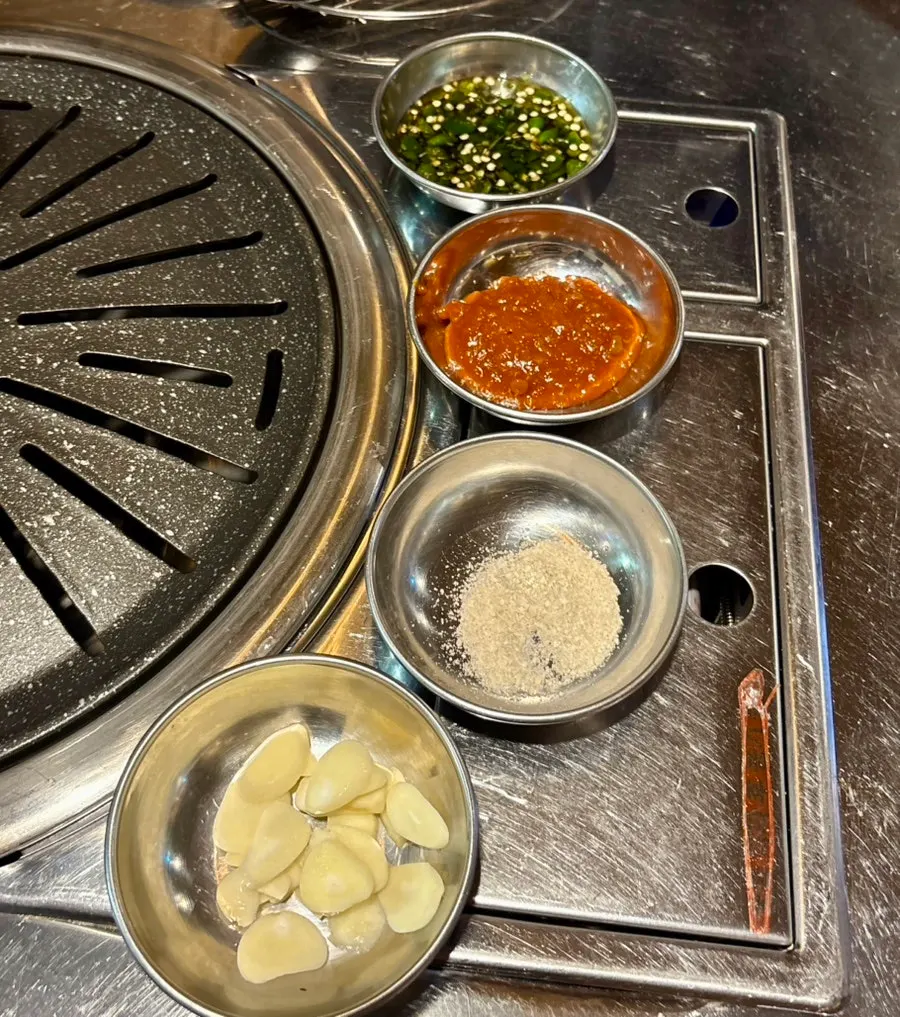 Plate of white kimchi and side dishes