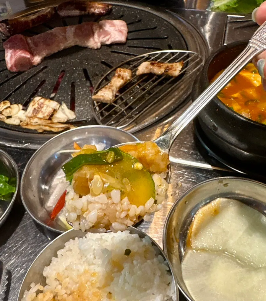 Gochujang stew with added chili mix, served with rice