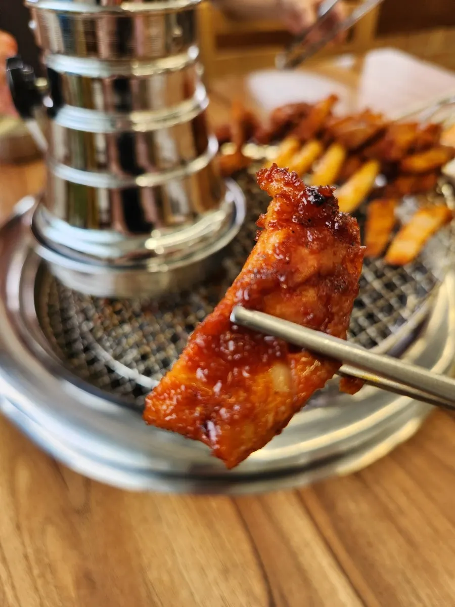 Golden-brown charcoal-grilled dakgalbi