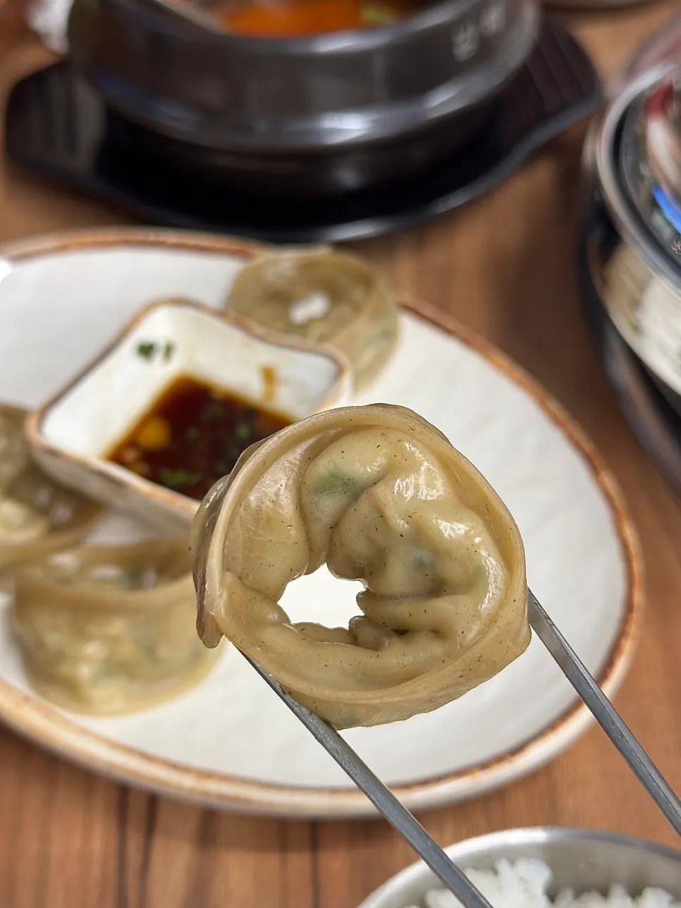 Buckwheat pheasant mandu cut open to show the filling