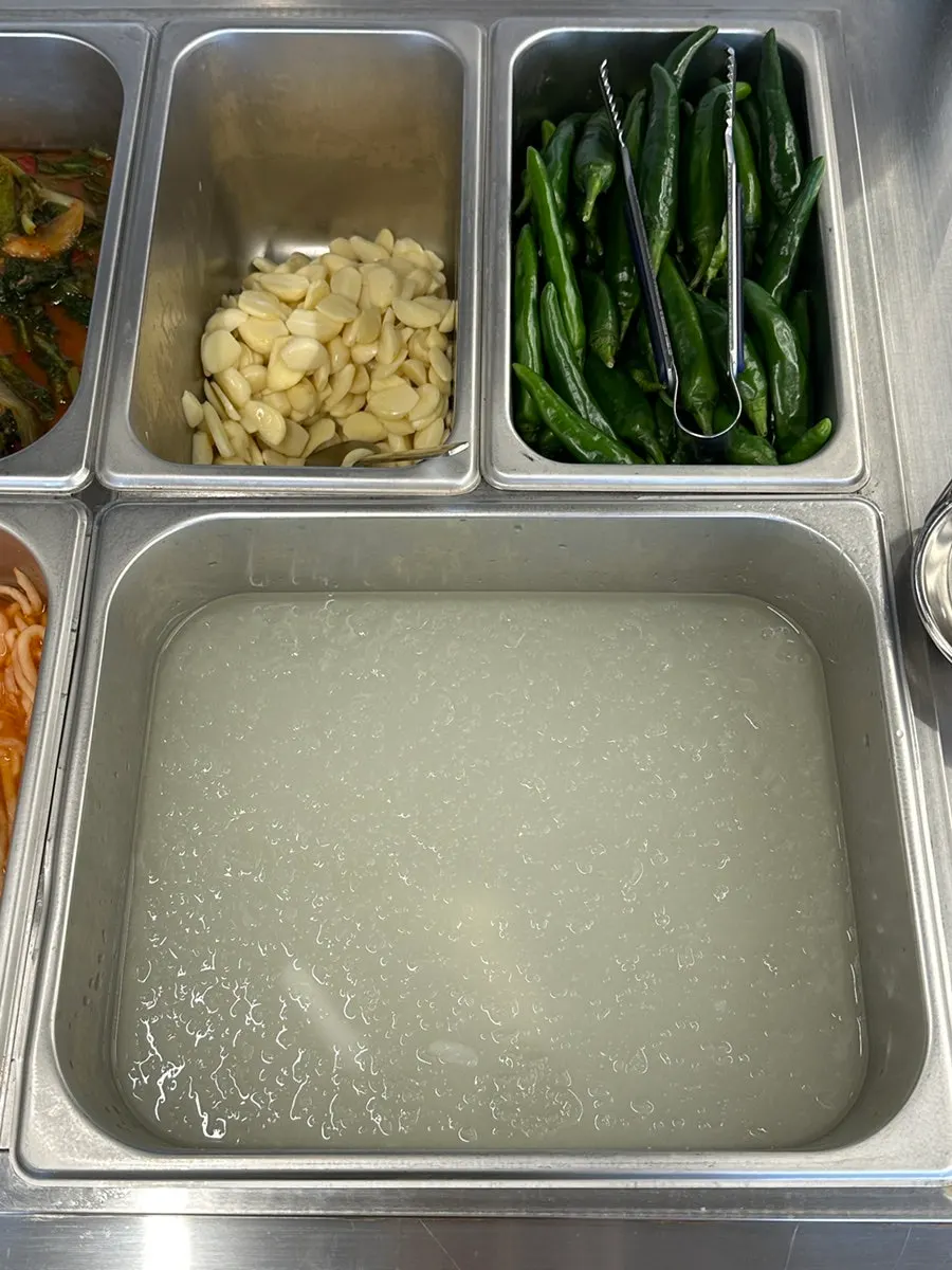 Yeolmu kimchi and dongchimi at the self-serve bar