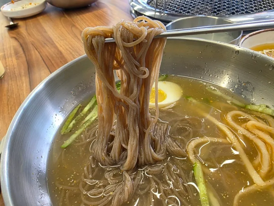 Chewy buckwheat noodles eaten with dakgalbi